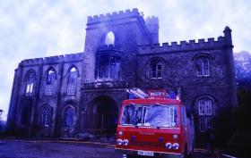 The burnt-out shell of Tynan Abbey, south Armagh, on 22 January 1981 following an IRA attack that killed 86-year-old Sir Norman Stronge and his only son, James. (Pacemaker)