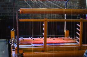 A special machine for priniting straight lines onto exercise books, ledgers, etc..