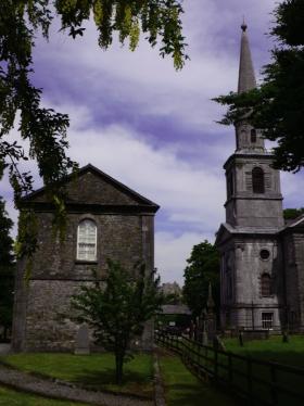 The library and cathedral framing the Rock of Cashel. (NIAH)