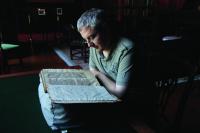 Writer-in-residence Conor Kostick peruses the ‘lost’ manuscript of Gerald of Wales’s Topographia Hibernica. (Jurga Rakausakite)
