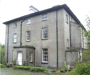 Corravahan House—a plain, square, three-storey-over-basement glebe house built in 1837–41. (NIAH)