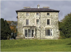 The south front features two tripartite windows with one mullioned in the style of James Wyatt (1746–1813). (NIAH)