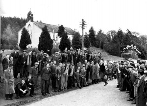 Liam O’Keeffe, Waterfall, throws during the first Munster road bowling championship in 1954 at Cloghroe, Co. Cork. Today the sport survives there, and in County Armagh. It also flourished for much of the nineteenth century around Belfast. (Fintan Lane)